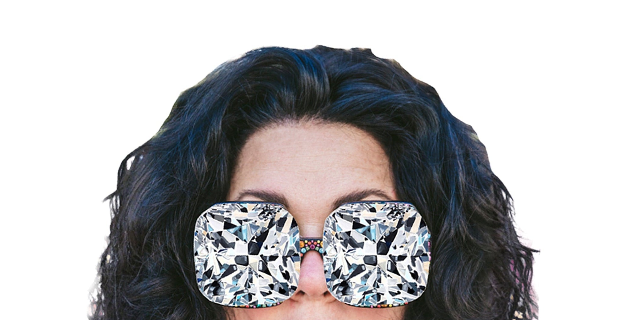 Person wearing large diamond-studded sunglasses with promotional text on a white background