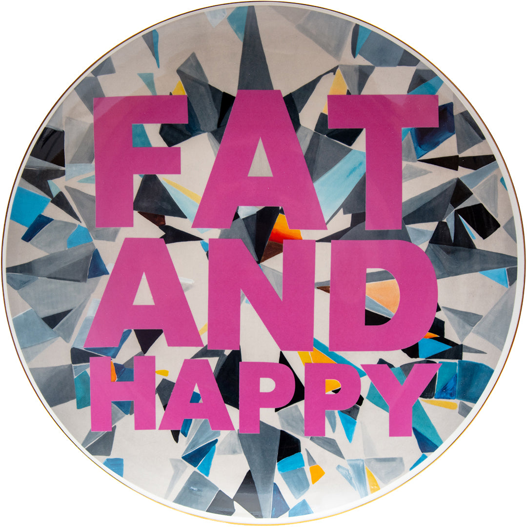 Circular Ashley Longshore porcelain platter with 'FAT AND HAPPY' text on a diamond background.