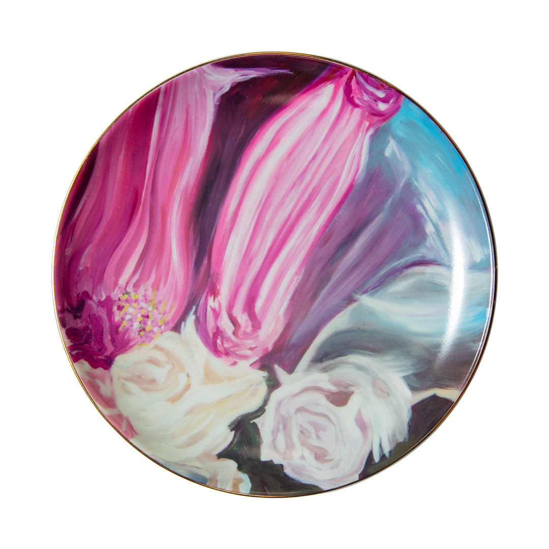 Porcelain dessert plate with mixed pastel floral design in pinks, creams, and aquas, trimmed in gold.
