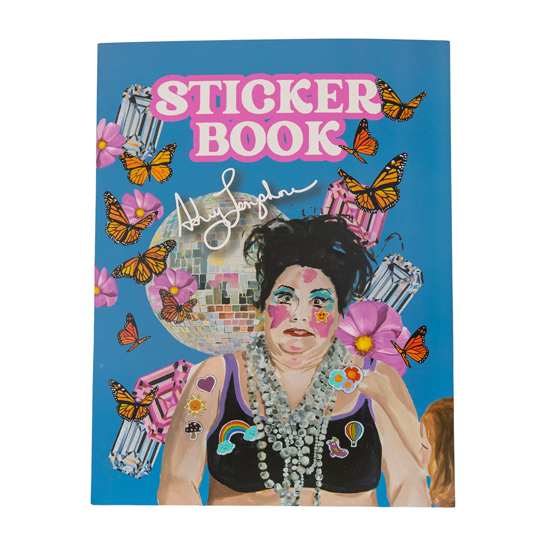 Front cover of the Ashley Longshore Happy AF Sticker Book featuring a colorful portrait surrounded by butterflies, flowers, and disco balls on a bright blue background.