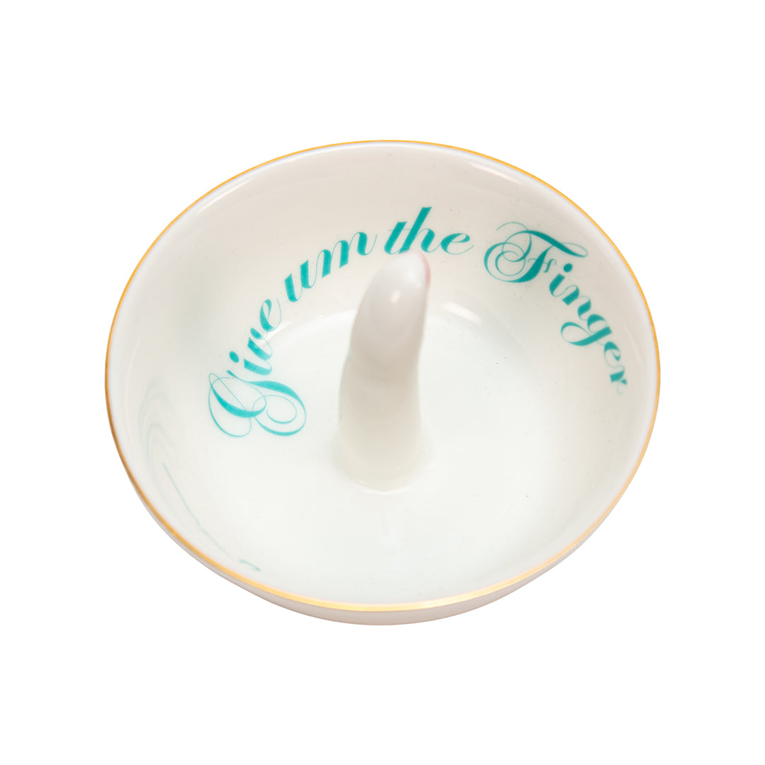 White ring dish with gold rim and turquoise text on a white background