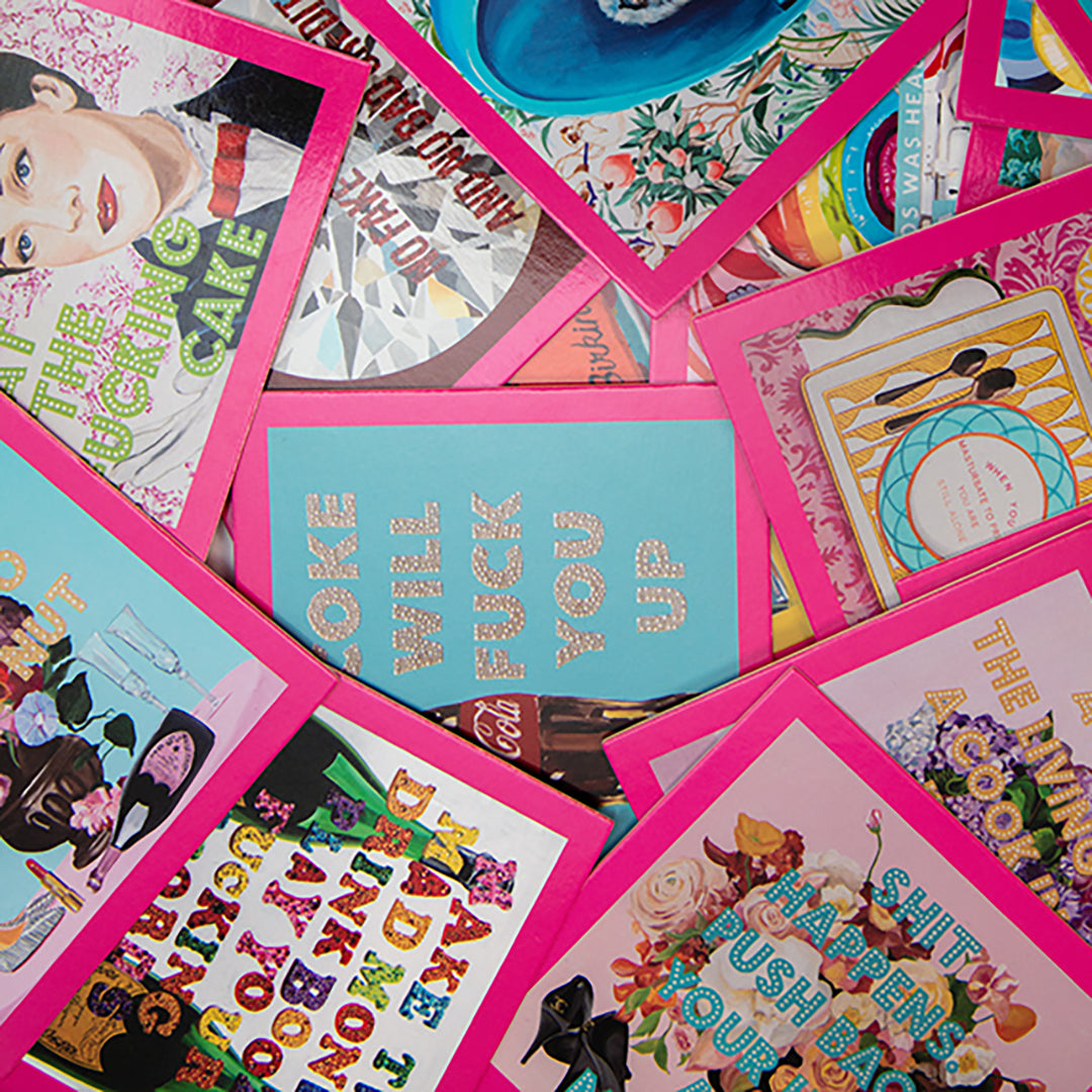 Collection of colorful cards with various designs and text.