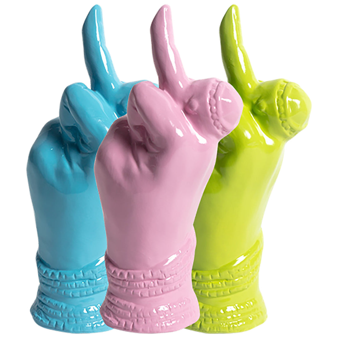 A set of three ceramic bud vases in pink, lilac, and blue colors, each shaped like a stylized hand making a 'bird' gesture.