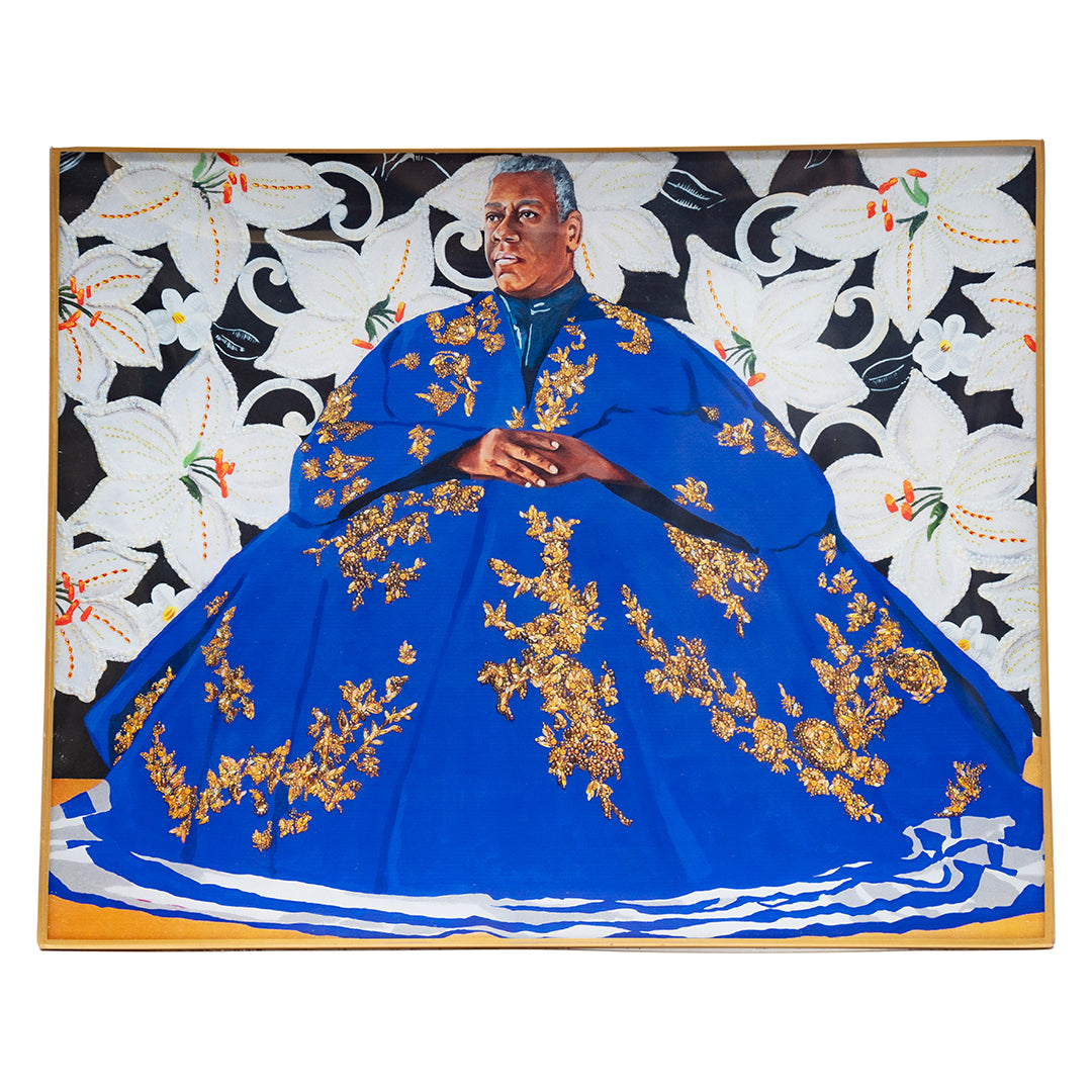 Person wearing a blue dress with gold embroidery against a decorative floral background