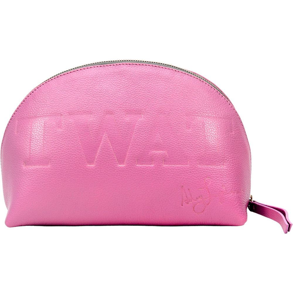 Front of the pink leather pouch with the embossed word and Ashley Longshore’s signature near the bottom.