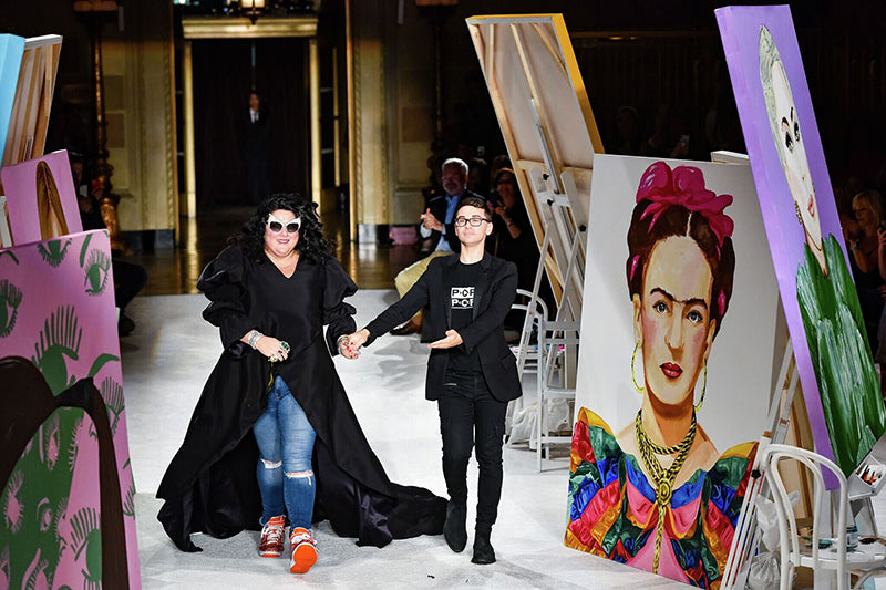 Artist Ashley Longshore and Designer Christian Siriano walking the runway at Christian Siriano's show.