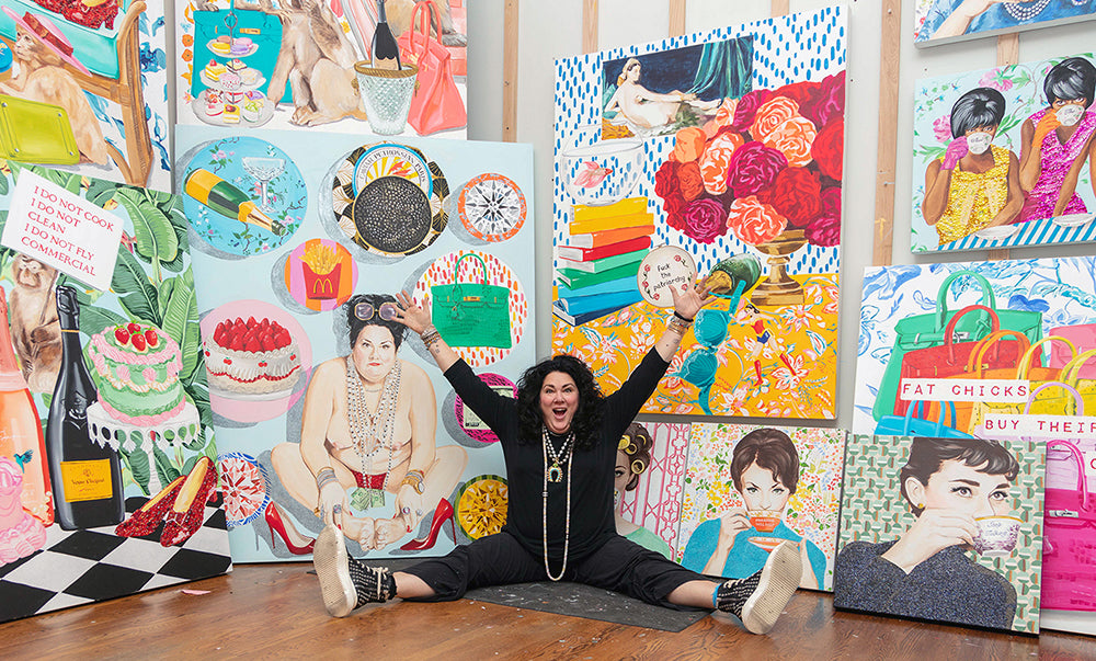 Pop artist Ashley Longshore seated on the floor of her studio in front of a selection of paintings. Pop Art, Feminist Art, Female Artist, Mighty Women, Birkins, Tea Party, Audrey Hepburn, Color, Pop, Fun, Love.