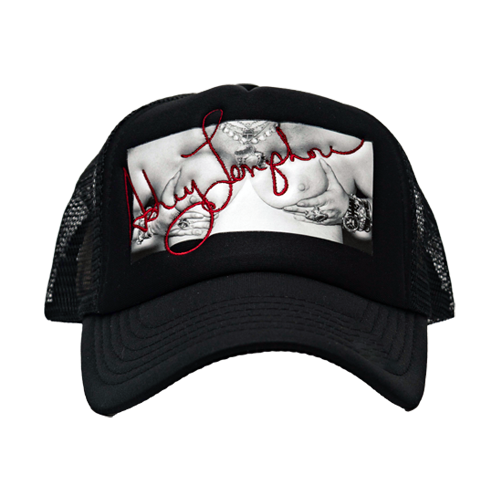 Ashley Longshore Litty Titty trucker hat with red stitching.