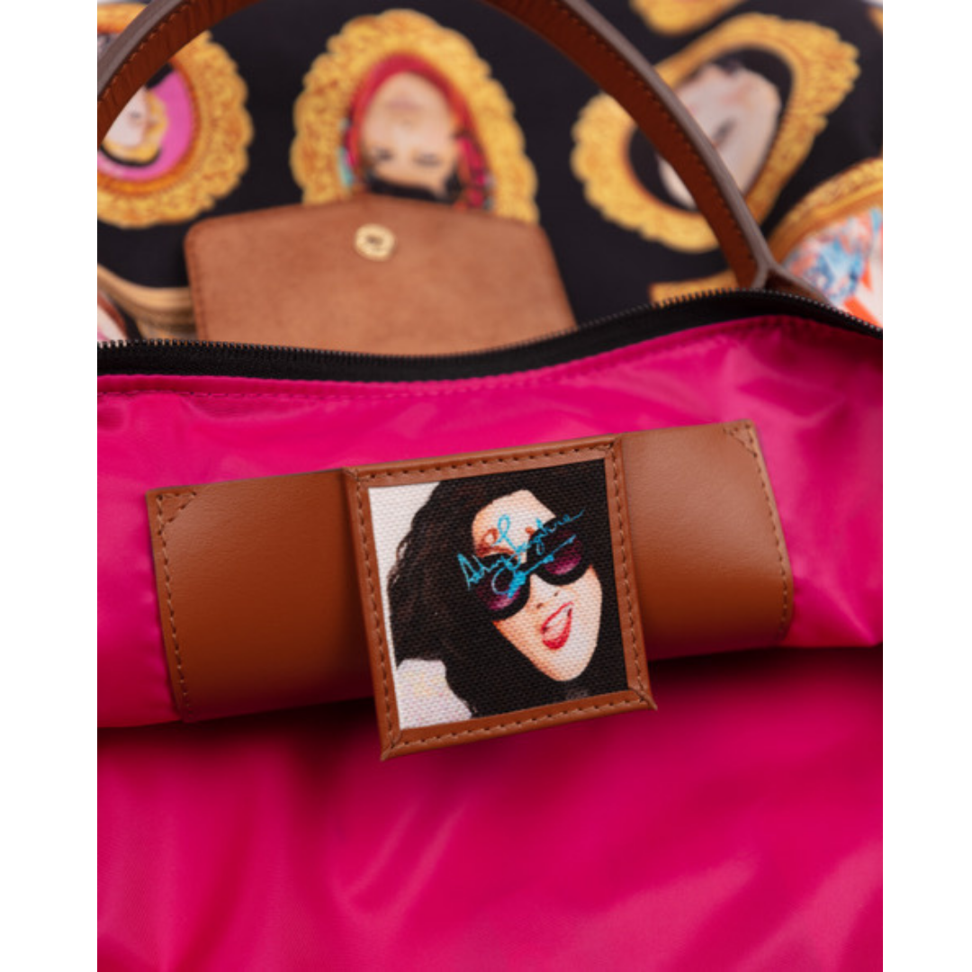OHHHHHHH YEAH!!! The Power Woman Tote featuring my paintings of iconic powerful women. Made in Italy and out of fine canvas with genuine Italian leather embossed with my signature... 20
