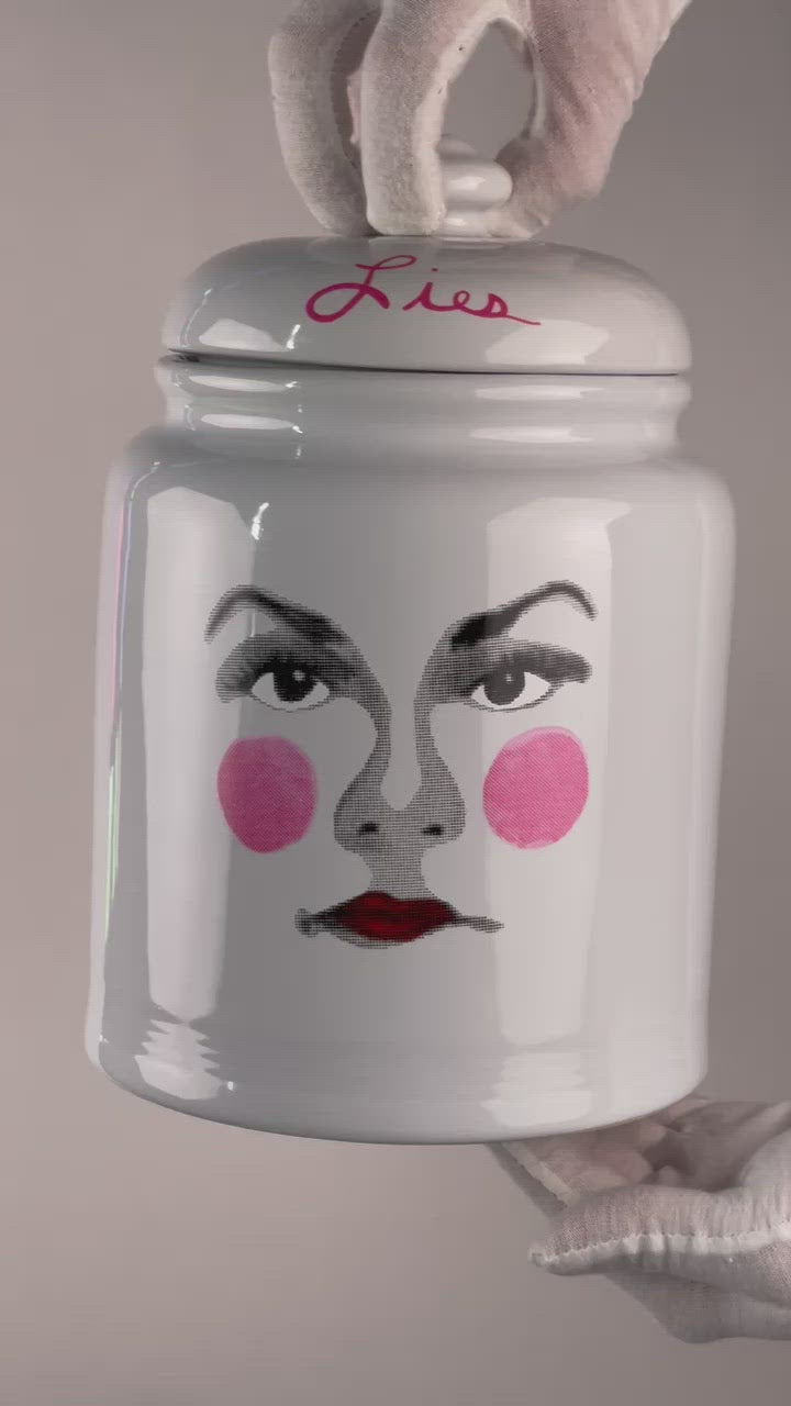 Porcelain Thought Jar, featuring a self-portrait of Ashley Longshore on one side with 